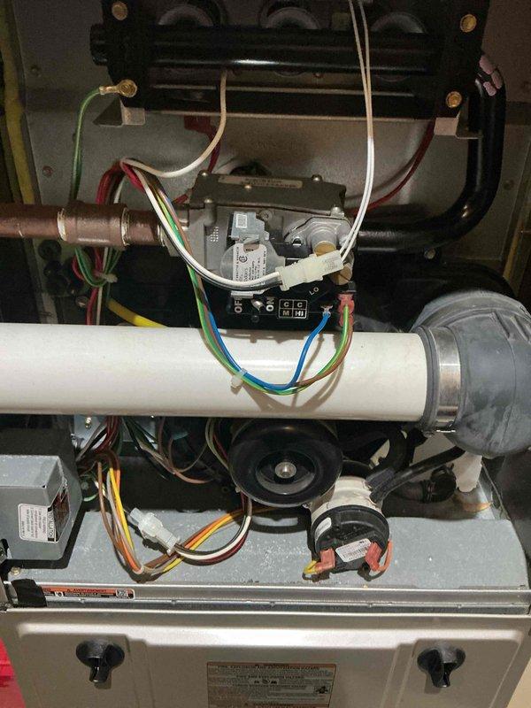 Completed annual heating maintenance on Bryant system. Performed comprehensive inspection of furnace components including gas valve assembly, burner assembly, heat exchanger, and blower motor. Verified proper operation of all safety controls and electrical connections. Inspected and tested programmable thermostat functionality, confirming accurate temperature reading and proper communication with heating system. Checked venting system including PVC intake and exhaust pipes for proper installation and secure mounting. All components found operating within manufacturer specifications with no issues identified.