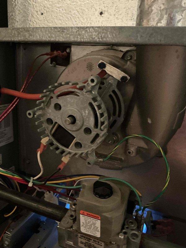 Responded to no heat call on 16-year-old residential furnace system experiencing operational noise issues. Upon inspection, accessed furnace cabinet and evaluated internal components including blower motor assembly, gas valve, and electrical connections. Identified failed inducer motor as primary cause of no heat condition. Replaced defective inducer motor, verified proper gas valve operation, inspected all wire connections and safety controls, and tested system startup sequence. Unit restored to full operational status with proper heating function confirmed.