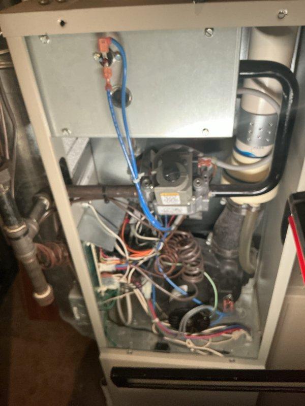 Performed annual heating maintenance on residential HVAC system. Inspected gas valve assembly, electrical connections, and all wiring for proper operation and safety. Examined heat exchanger, burner assembly, and flue piping for signs of corrosion or deterioration. Verified proper gas pressure and tested all safety controls. Checked blower motor operation and inspected refrigerant lines for damage. System operating within normal parameters with no immediate repairs required.