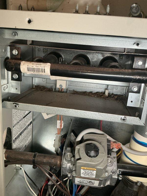Performed annual heating maintenance on residential HVAC system. Inspected gas valve assembly, electrical connections, and all wiring for proper operation and safety. Examined heat exchanger, burner assembly, and flue piping for signs of corrosion or deterioration. Verified proper gas pressure and tested all safety controls. Checked blower motor operation and inspected refrigerant lines for damage. System operating within normal parameters with no immediate repairs required.