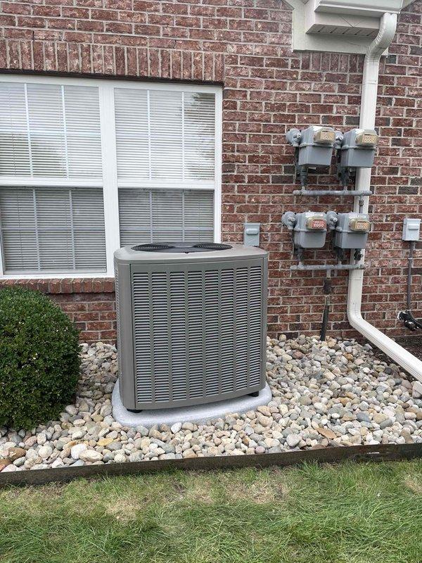 Completed full HVAC system installation including a 90,000 BTU furnace and 2.5 ton air conditioning system with matching evaporator coil in rear yard location. Installed new condensing unit on rock bed exterior pad with proper clearances, ran refrigerant lines and electrical connections to indoor air handler, and integrated whole-home humidifier into ductwork. Established all condensate drainage through PVC piping to floor drain, reconnected existing ductwork to new equipment, and verified proper system operation including airflow, refrigerant charge, and thermostat functionality.