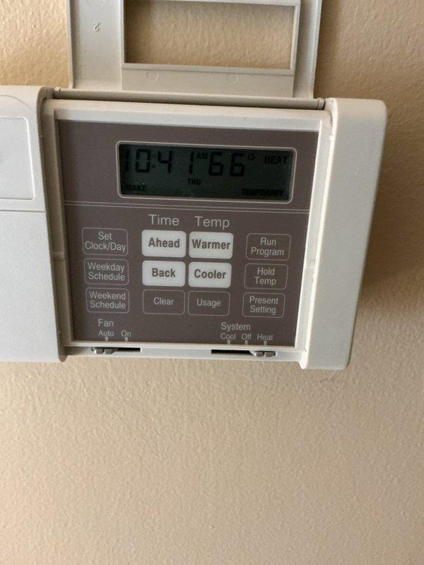 Completed comprehensive AC tune-up on 10+ year old Bryant system that was operating properly upon arrival. Performed standard preventive maintenance procedures including inspection of all major components, cleaned condenser coils, checked refrigerant levels and pressures, tested electrical connections, verified thermostat operation and programming functionality, and documented system performance with photos of equipment and controls. System confirmed to be in good working order with no immediate repairs needed at time of service.