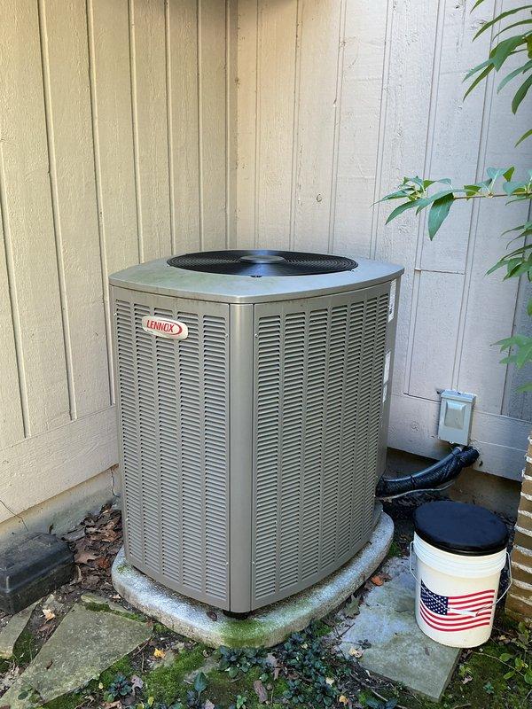 Performed comprehensive preventive maintenance on a 2-year-old Lennox central air conditioning system. Completed full system inspection including condenser unit exterior examination, verified proper refrigerant line connections, and assessed electrical disconnect operation. Noted minor debris accumulation and moss growth on concrete pad around outdoor unit, which is typical for the system's location against exterior wall. System operating within normal parameters with no deficiencies requiring immediate attention at time of service.
