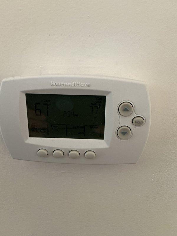 Completed annual heating and cooling maintenance on HVAC system. Performed comprehensive inspection of heating components, replaced air filters and evaporator pads, and verified proper operation of Honeywell Home thermostat with confirmed temperature setpoints of 67°F heat and 77°F cool. All equipment operating within normal parameters.