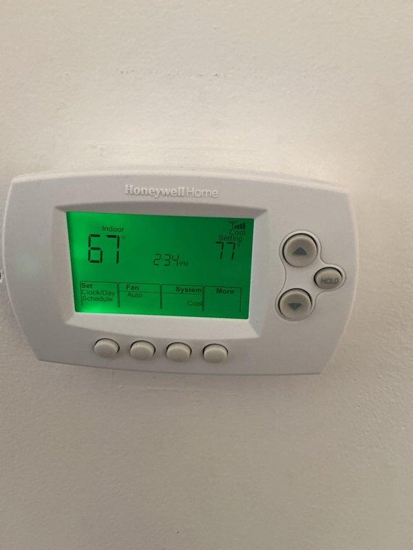 Completed annual heating and cooling maintenance on HVAC system. Performed comprehensive inspection of heating components, replaced air filters and evaporator pads, and verified proper operation of Honeywell Home thermostat with confirmed temperature setpoints of 67°F heat and 77°F cool. All equipment operating within normal parameters.