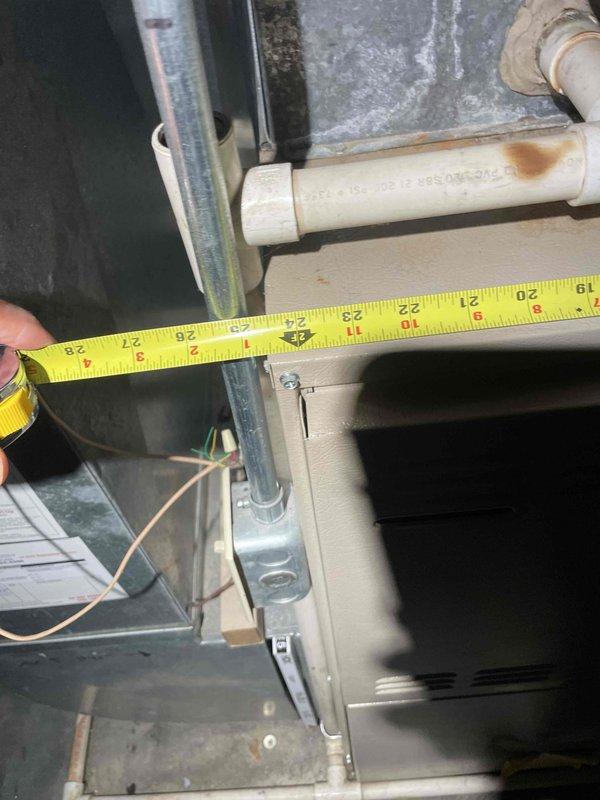 Completed comprehensive estimate for full HVAC system replacement. Performed detailed measurements of existing ductwork and air handling equipment to assess compatibility and sizing requirements for new system installation. Documented current galvanized metal supply and return duct dimensions, verifying proper sizing specifications for equipment matching. Inspected existing PVC condensate drain line configuration and noted evidence of previous moisture issues requiring attention during system replacement. Evaluated mechanical room layout and clearance requirements for new equipment placement. Assessed structural framing and mounting locations for proper equipment support. Photographed and measured critical dimensions of existing equipment cabinet and ductwork connections to ensure accurate replacement system specifications. Verified electrical connection points and reviewed accessibility for future service requirements. Provided customer with detailed proposal for complete system repla