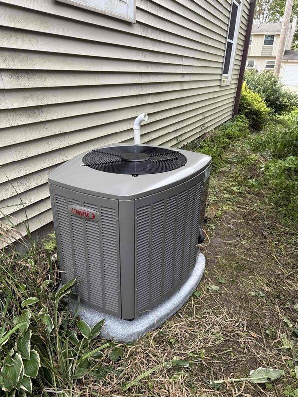 Completed full HVAC system installation including 70,000 BTU furnace, 2.5-ton air conditioning unit, and evaporator coil. Positioned AC condenser unit in left side yard on composite pad with proper refrigerant line connections and condensate drainage. Successfully reconnected all electrical and mechanical components, verified system operation, and finalized all required permit documentation.