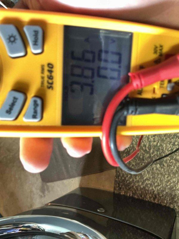 Performed comprehensive air conditioning tune-up on outdoor condensing unit. Conducted complete system inspection including electrical testing with digital multimeter and clamp meter to verify proper voltage, amperage, and component operation. All measurements within manufacturer specifications. Cleaned and inspected unit components, verified refrigerant pressures, checked electrical connections, and confirmed proper system operation. Unit operating efficiently with no deficiencies noted at time of service.