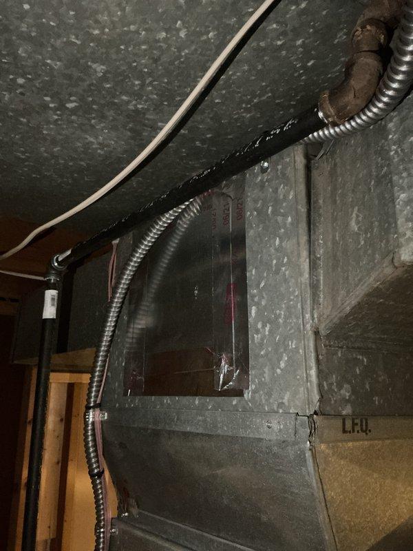 Completed furnace-only installation of 70,000 BTU heating unit with mechanical reconnection to existing ductwork and plumbing infrastructure. Permit was obtained prior to installation work. All gas piping, condensate drainage, and electrical connections were properly secured and tested for safe operation per manufacturer specifications and local building codes.
