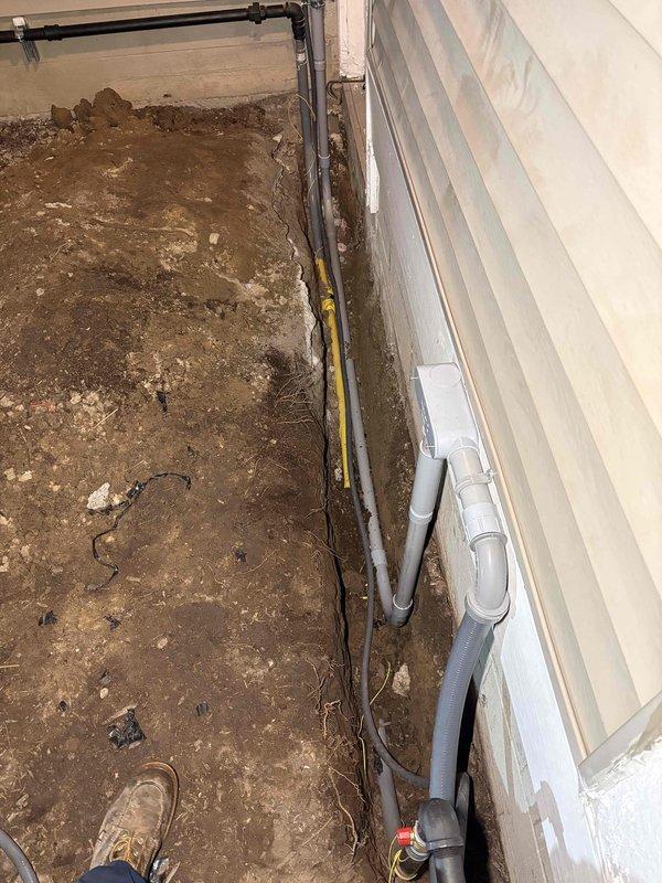 Completed installation of 26RCA standby generator and RXT-JFNC-150ASE automatic transfer switch at residential property. Ran gas piping from existing meter to generator location in left side yard, including flexible connector and shut-off valves. Installed electrical conduit and wiring from main service panel through basement crawl space to exterior generator pad, connecting transfer switch to isolate essential circuits. Obtained mechanical, electrical, generator, and gas pipe permits prior to installation. Tested system operation, verified proper transfer switch functionality during simulated power outage, and confirmed all safety interlocks engaged correctly.