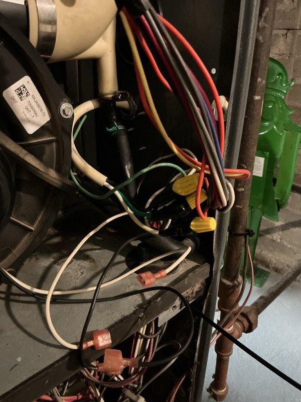 Responded to no heat call for 1-year-old gas forced air furnace experiencing short cycling and intermittent operation. Upon inspection, found loose wire connections at the control board causing intermittent power supply to ignition system. Secured all electrical connections with proper wire nuts, verified proper voltage at transformer and control circuits. Tested furnace through multiple heating cycles to confirm stable operation. System now operating normally with proper ignition sequence and consistent heat output.