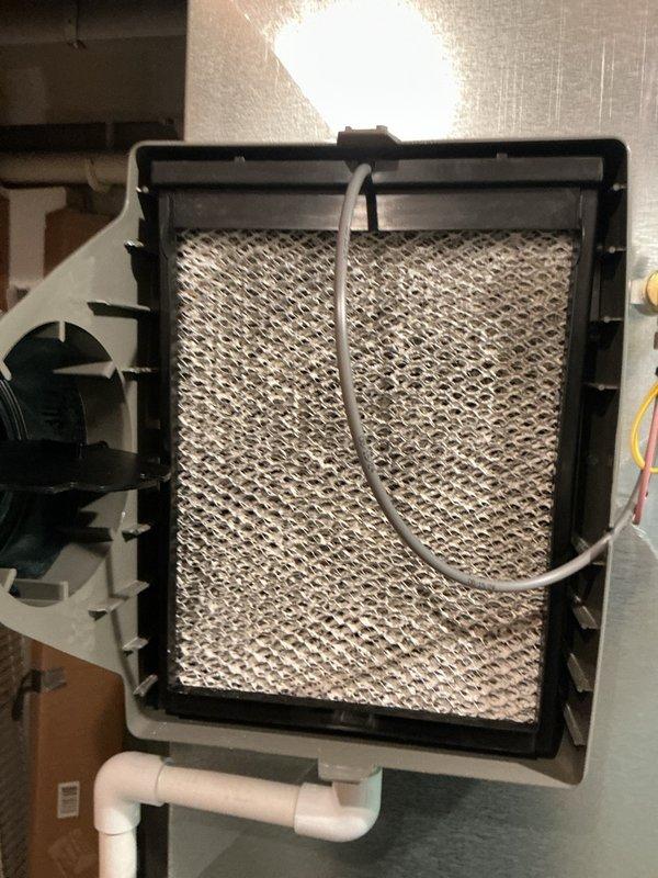 Completed annual cooling maintenance on Lennox air conditioning system. Inspected outdoor condensing unit, verified proper operation of compressor and condenser fan, checked refrigerant levels and electrical connections. Examined indoor evaporator coil assembly and humidifier pad, confirmed drainage system functionality, and replaced furnace filters to maintain optimal airflow and system efficiency.