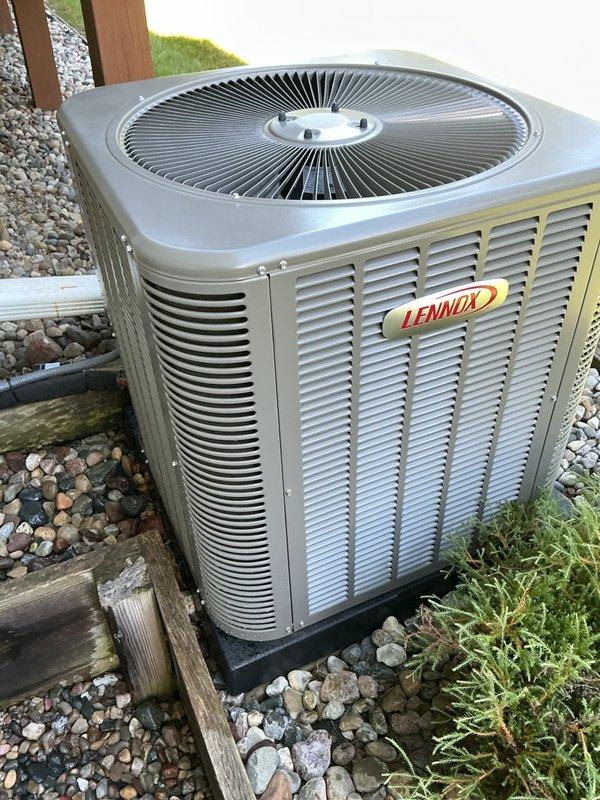 Completed annual cooling maintenance on Lennox air conditioning system. Inspected outdoor condensing unit, verified proper operation of compressor and condenser fan, checked refrigerant levels and electrical connections. Examined indoor evaporator coil assembly and humidifier pad, confirmed drainage system functionality, and replaced furnace filters to maintain optimal airflow and system efficiency.