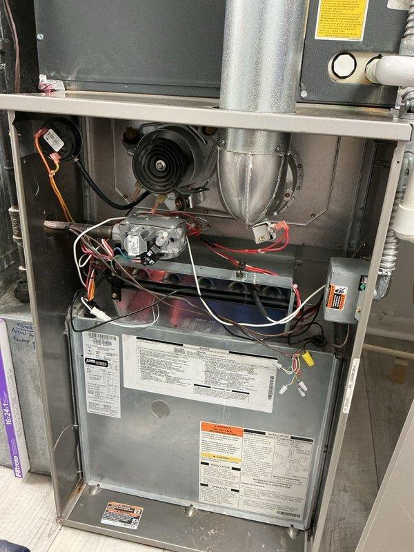 Completed annual heating maintenance on residential forced-air furnace system. Performed comprehensive inspection of all internal components including blower motor assembly, draft inducer, gas valve, heat exchanger, burner assembly, electrical connections, and control board. Verified proper operation of all safety systems, checked wiring harnesses for secure connections, and confirmed unit specifications against manufacturer labels. All components found in working condition with no repairs needed at this time.