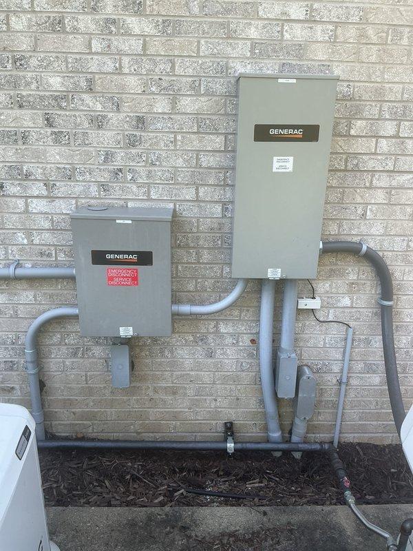 Performed routine maintenance inspection on two Generac Guardian standby generators operating in parallel configuration. Investigated customer concern regarding green and amber indicator lights displaying on both units. Verified both generators were functioning properly and confirmed that the illuminated status lights indicated normal standby mode operation with no fault conditions present. Inspected control panels, battery connections, transfer switches, and utility connections on both systems. All components found to be in proper working order with no corrective action required.