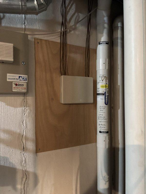 Conducted comprehensive evaluation of existing HVAC system for full replacement estimate. Assessed 25-year-old Carrier furnace located in basement and 25-year-old air conditioning unit positioned outside, both units having reached end of serviceable life expectancy. Documented current equipment specifications, configuration, and installation conditions through detailed photography of furnace, air handler, ductwork connections, refrigerant line routing, condensate drainage system, and mechanical room layout. Evaluated electrical connections, venting systems including white PVC exhaust pipes, and existing ductwork infrastructure to determine compatibility requirements for new equipment installation. Provided homeowner with replacement options and system sizing recommendations for single-family residential application to restore whole-home climate control functionality.