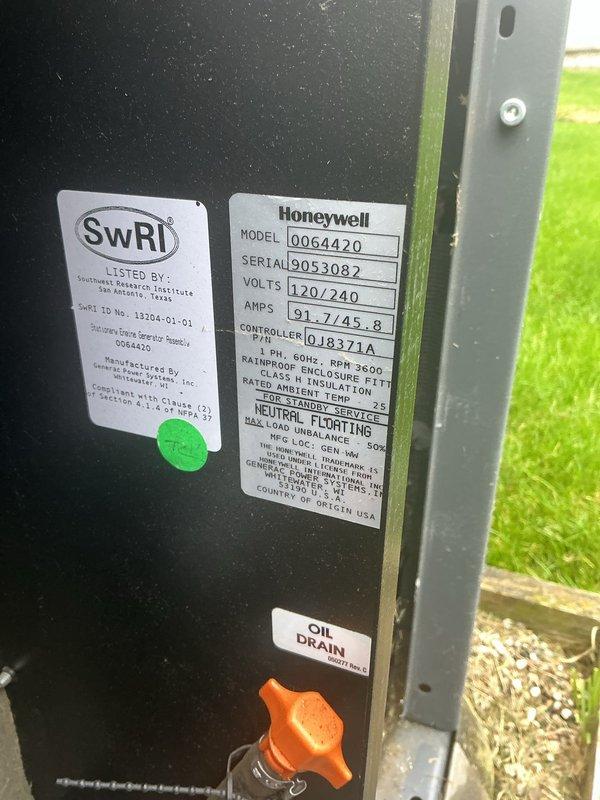 Performed scheduled maintenance on an 11kW Honeywell standby generator using maintenance kit #6483. Completed oil change via drain valve, replaced spark plugs showing normal wear deposits, and conducted full system inspection per manufacturer specifications.