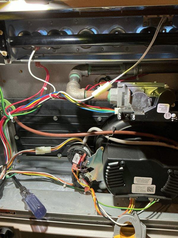 Completed annual heating check on gas furnace system. Inspected burner assembly with all burners firing properly with clean blue flames, verified gas valve operation and connections, checked electrical components and wiring harness, and replaced furnace filter per customer request. All safety controls, ignition system, and flame sensor tested and confirmed operational. System running efficiently with no issues found.