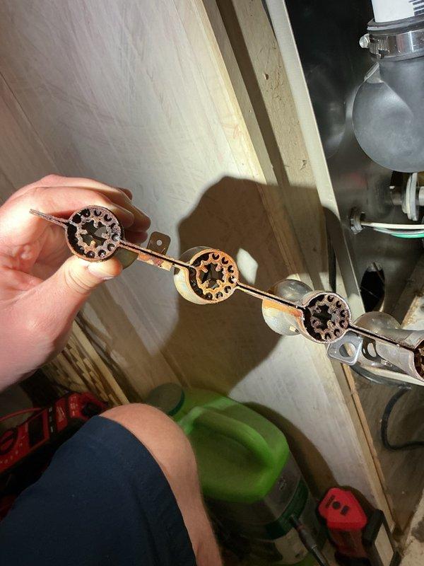 Responded to no-heat call on forced air furnace with intermittent ignition failure and fault code 41/14. Upon inspection, diagnosed failed pressure switch assembly causing improper system operation and preventing ignition sequence. Removed defective four-port pressure switch assembly and replaced with new unit. Tested furnace operation through multiple heating cycles, verified proper ignition sequence, confirmed all pressure switches functioning correctly, and restored full heating capability to system.