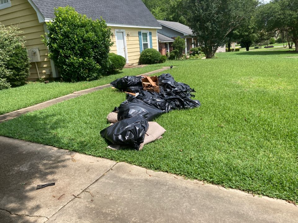 Montgomery, AL - Protek picking up debris from a water mitigation for a satisfied customer in Montgomery. Montgomery, AL - Protek picking up debris from a water mitigation for a satisfied customer in Montgomery.