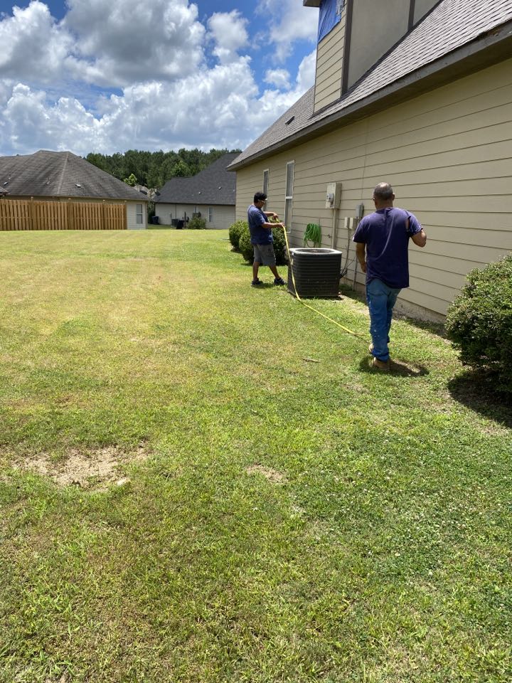 PROTEK crew measuring to replace some wood damage discovered when the gutter were removed on this storm damage job in Calera.  