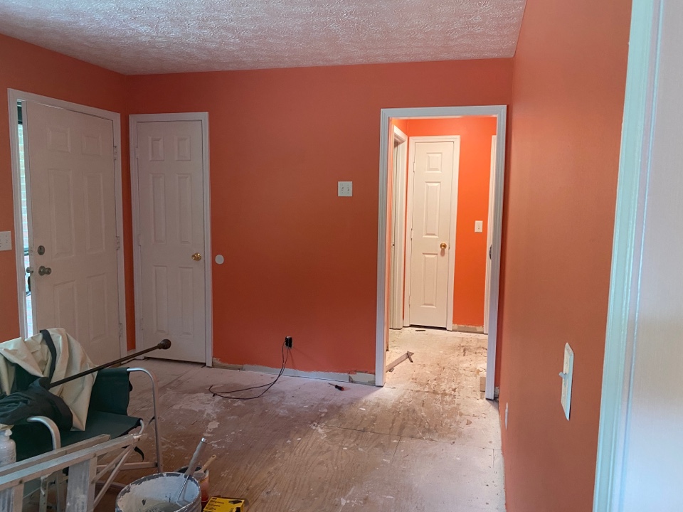 Protek Restoration painting this house in Clanton before the floors get delivered and installed. 