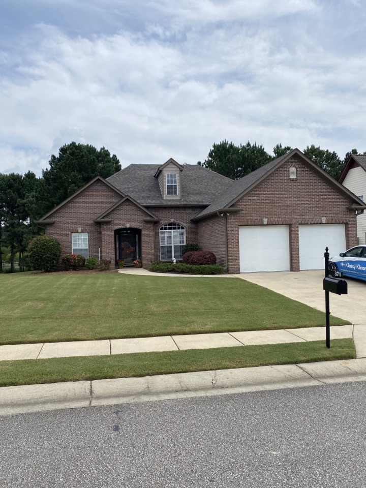 ProTek project manager inspecting a completed roof job at this house in Calera. Beautiful job! Now onto the other work.