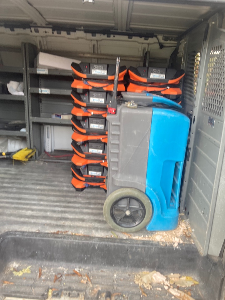 Protek picking up equipment from a water mitigation for a satisfied customer in Millbrook.