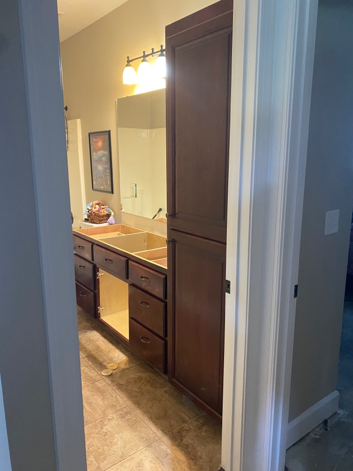 Protek Restoration has put the vanity in. Just have to add the door and the vanity and linen cabinet build will be complete. This home in located in Deatsville. 