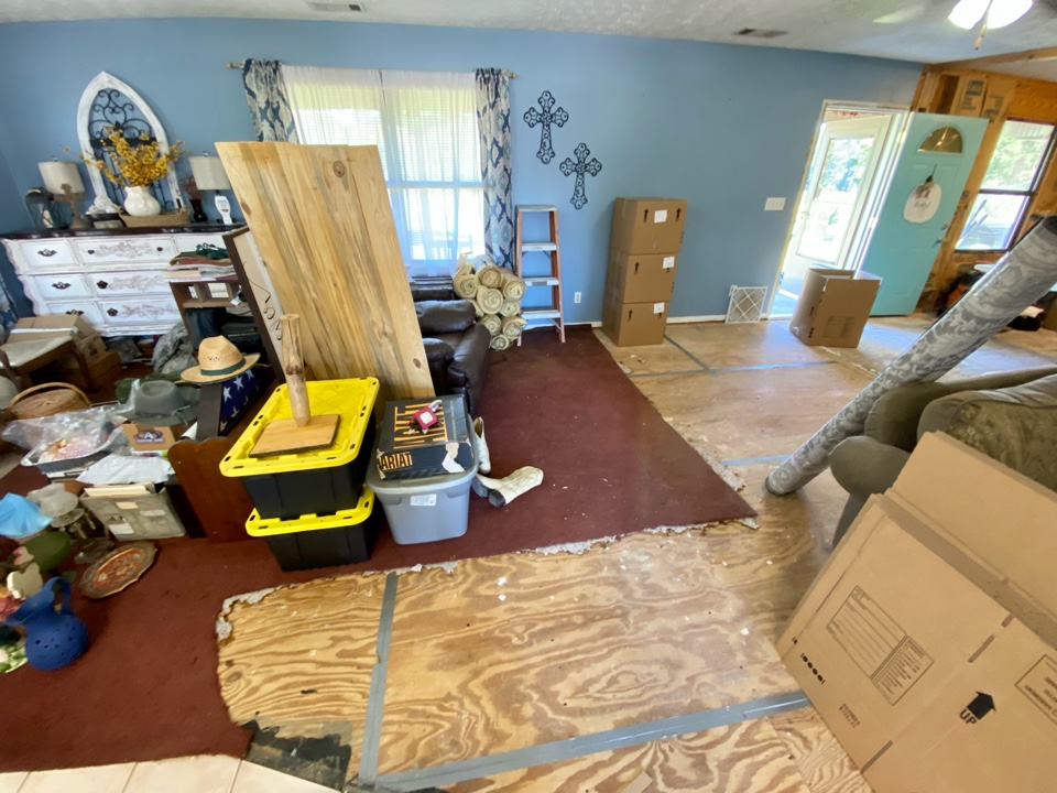 This home suffered water and mold damage to the floors through out their home. Protek’s Content Crew are hard at work packing contents so that repairs can begin. 