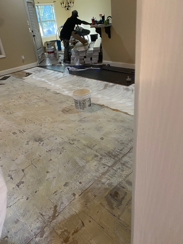 Protek Restoration putting down hardwood floors in this beautiful home in Montgomery. 