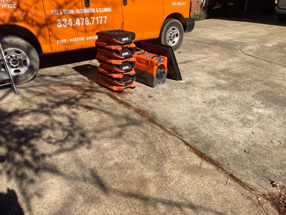 Protek picking up equipment from a water mitigation for a satisfied customer in Wetumpka.