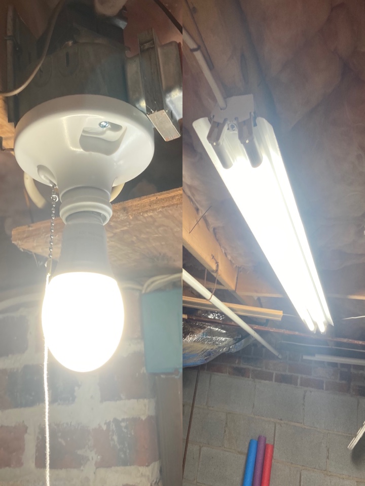 Electrician repairing non working basement lights. 