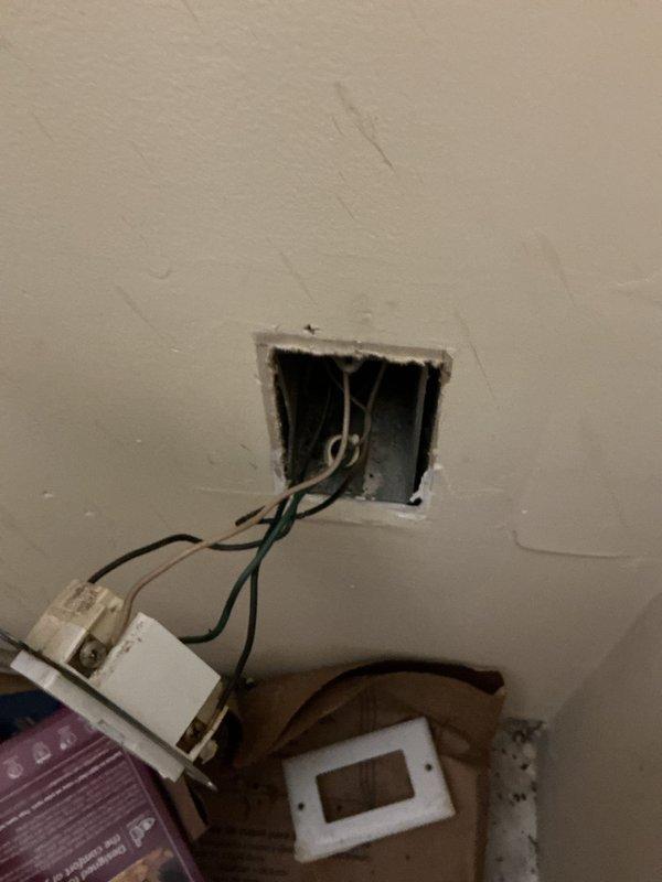 Responded to service call regarding non-functional outdoor lighting. Performed electrical panel inspection, noting panel dating from approximately 1981 with visible wire disorganization. Accessed junction box, removed faceplate, and examined existing wiring connections. Completed necessary repairs to restore functionality to front and back exterior lighting fixtures.