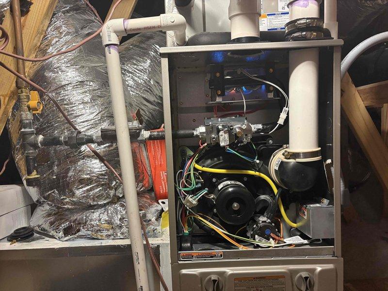 Responded to warranty service call for 5-year-old system experiencing heating failure. Diagnosed gas valve malfunction through pressure testing, with manometer readings confirming 342 on both P1 and P2 ports. Successfully replaced defective gas valve and verified proper system operation by conducting post-installation pressure tests and cycling the furnace through normal operation.