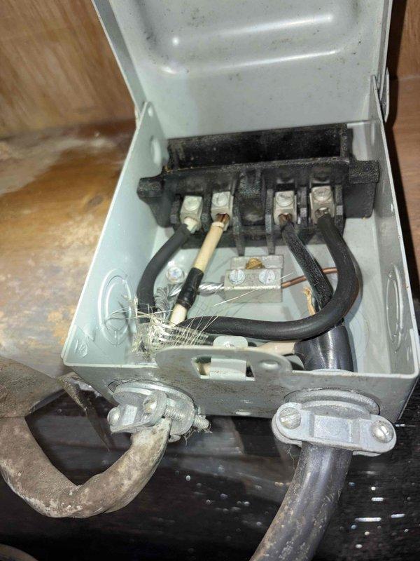 Performed comprehensive tune-up on 11-year-old HVAC system. Conducted electrical diagnostic testing with Fluke 374 FC True RMS clamp meter revealing 343 amp reading. Inspected junction box connections showing signs of age-related wear and minor corrosion on terminal connections.