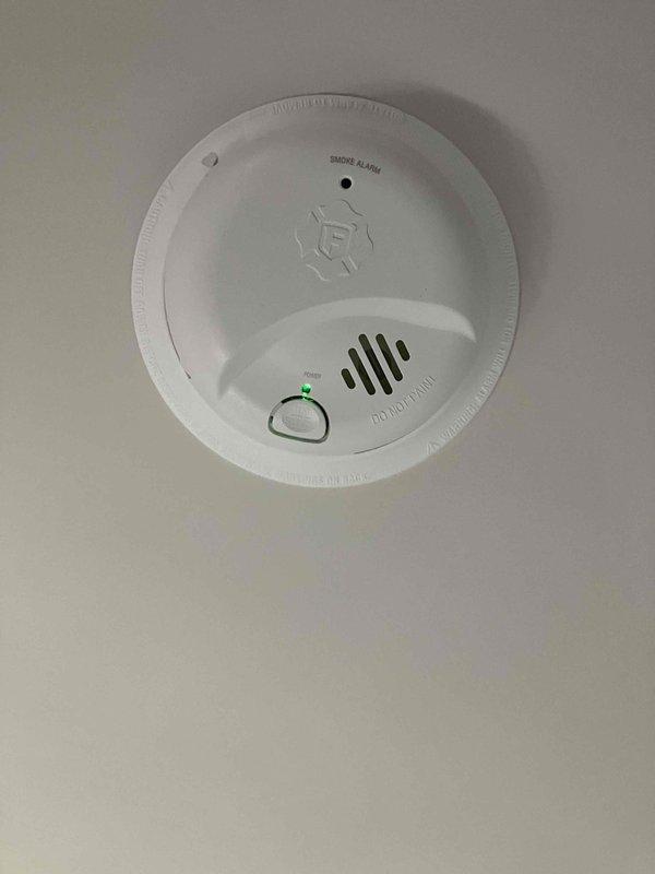 Responded to service call regarding malfunctioning hard-wired smoke detectors previously removed by fire department. Installed six new smoke/CO2 combination detectors throughout the residence, ensuring proper functionality and interconnection. Additionally, installed whole home surge protector at main electrical panel to provide comprehensive electrical protection for the household, with special consideration for medical equipment requirements.