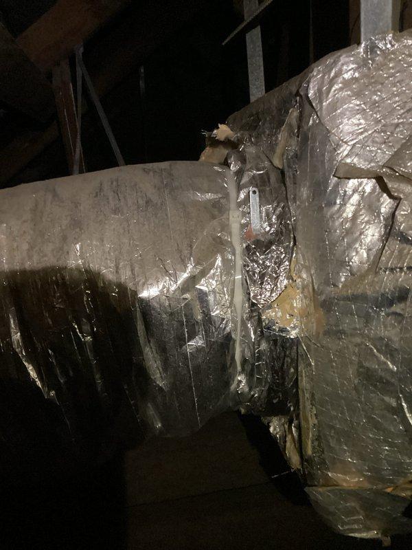 Conducted inspection of damaged ductwork insulation at connection points, documenting torn reflective insulation and compromised seals. Scheduled installation of manual dampers to address airflow regulation issues, with parts to be acquired prior to the scheduled completion.