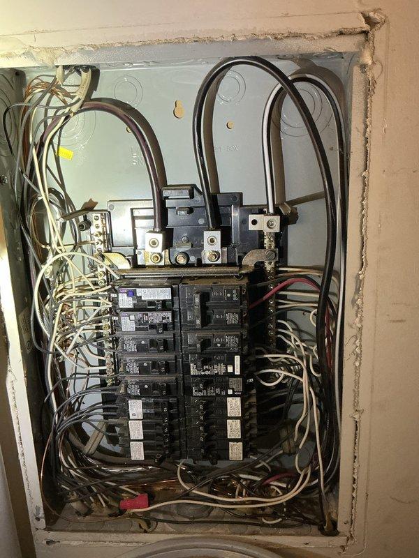 Responded to service call to install a surge protector in the crawl space as requested by customer's HVAC installation company. Accessed electrical panel, removed cover to expose internal components, and installed appropriate surge protection device by connecting it to two adjacent breakers. Verified proper installation and functionality of the surge protector before completing the job.