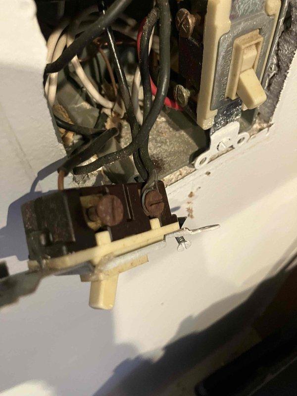 Responded to service call for multiple non-functional electrical outlets throughout the residence. Performed comprehensive testing of affected outlets using Klein Tools RT250 GFCI tester, confirming proper wiring in ceiling outlets (verified "CORRECT" status). Inspected wall switch junction box, identifying accumulated dust and aging connections with discolored wiring. Cleaned terminals and restored functionality to all non-working outlets.