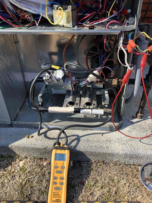 Responded to customer callback for a non-operational 2021 gas heating unit. Performed diagnostic testing on the system using digital multimeter, which registered 104.7 on internal components. Inspected electrical connections and control board, and verified proper power supply from the exterior meter.