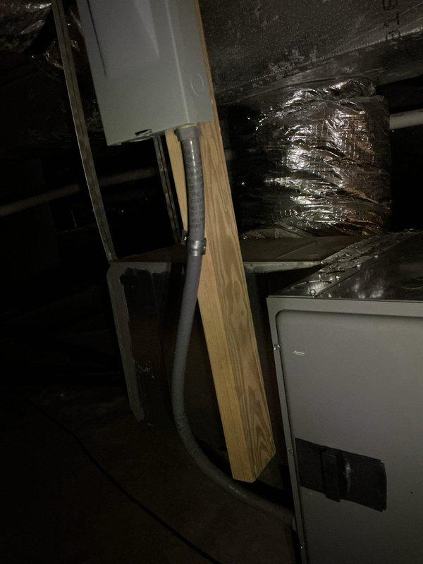 Installed new HVAC system with proper electrical connections in mechanical area. Secured junction box to structural support and ran flexible conduit for power supply. Verified proper insulation of adjacent ductwork during installation process.