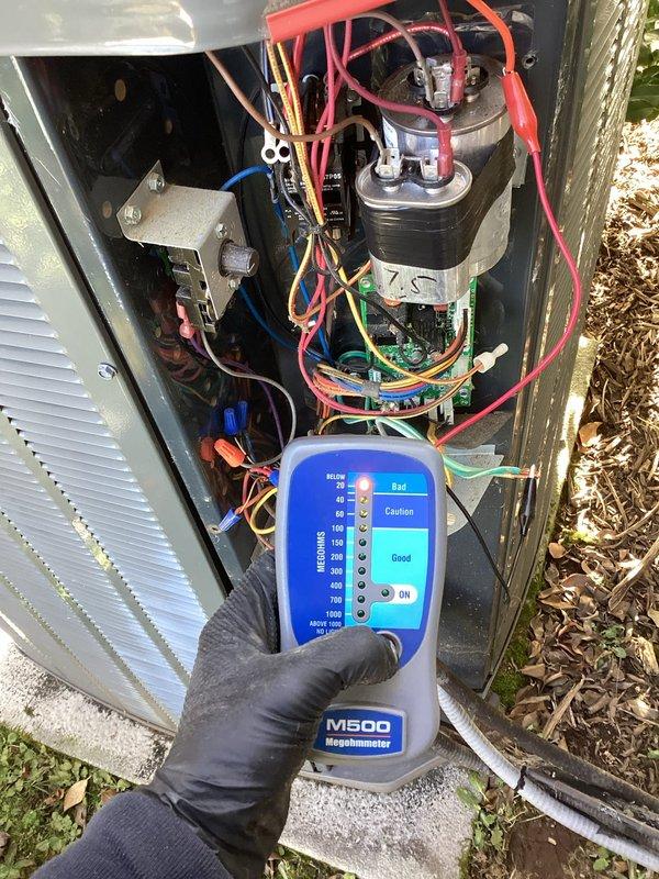 Performed diagnostic testing on HVAC system after customer reported unit operating on emergency heat mode. Utilized M500 Megohmmeter to test electrical components and wiring integrity. Tests confirmed electrical readings within good range, indicating proper insulation resistance in system components. Identified and documented multiple installation errors that were causing system malfunction.
