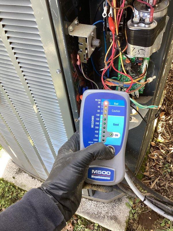 Performed diagnostic testing on HVAC system after customer reported unit operating on emergency heat mode. Utilized M500 Megohmmeter to test electrical components and wiring integrity. Tests confirmed electrical readings within good range, indicating proper insulation resistance in system components. Identified and documented multiple installation errors that were causing system malfunction.