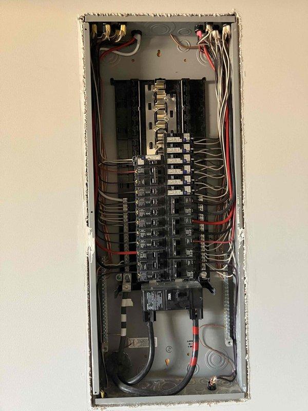 Conducted site evaluation for upcoming hot tub installation. Inspected main electrical panel to assess available capacity for new 240V circuit. Documented existing breaker configuration and wiring to prepare comprehensive quote for installation of dedicated outlet and final connections once hot tub is delivered.