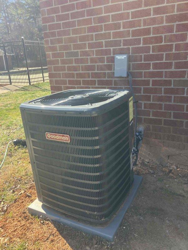 Responded to service call regarding intermittent dripping sound when heating system operates on recently installed Goodman unit. Performed visual inspection of outdoor condenser unit and electrical connections. Checked circuit breaker panel and verified proper amperage to HVAC system. No active leaks or condensation issues were identified during inspection.