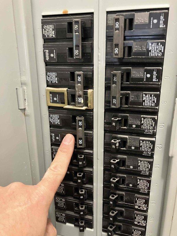 Responded to service call regarding intermittent dripping sound when heating system operates on recently installed Goodman unit. Performed visual inspection of outdoor condenser unit and electrical connections. Checked circuit breaker panel and verified proper amperage to HVAC system. No active leaks or condensation issues were identified during inspection.