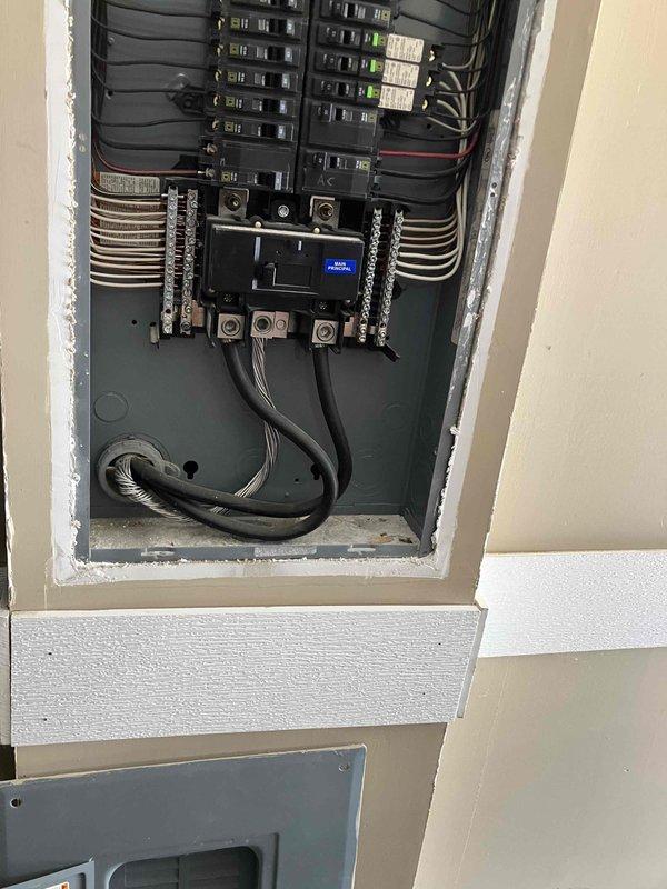 Successfully installed a motion-activated exterior light fixture above the sliding glass door in the backyard. Accessed electrical panel to establish proper circuit connection, then mounted fixture securely to the exterior siding. Tested motion sensor functionality to ensure proper operation.