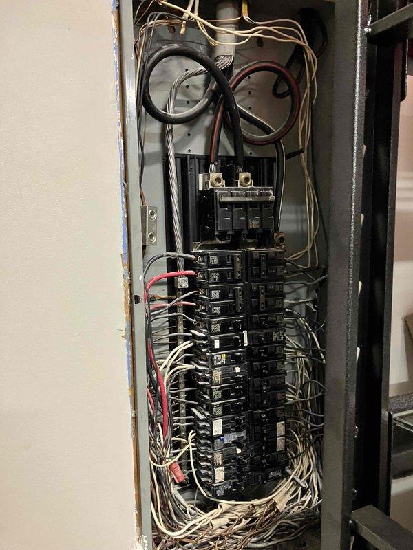 Performed site assessment for installation of portable generator with transfer switch at 40-year-old residence. Examined main electrical panel and exterior meter to evaluate integration requirements. Discussed customer's request for natural gas connection compatibility with the generator system.