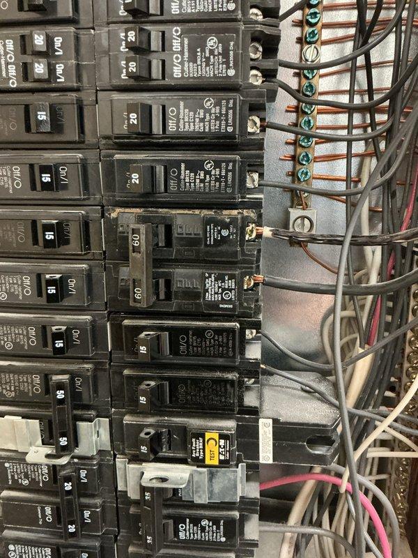 Completed annual 32-point electrical system evaluation including panel maintenance with proper torquing of connections. Performed comprehensive testing of GFCI outlets, Arc Fault breakers, and smoke/CO2 detectors with battery replacement as needed. Visual inspection of the electrical panel revealed properly organized circuit breakers with appropriate wire management and no visible damage or deterioration.